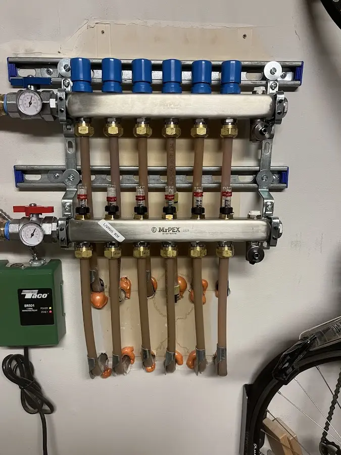 Plumber performing Gas Line Installation at a residential property in Gluckstadt